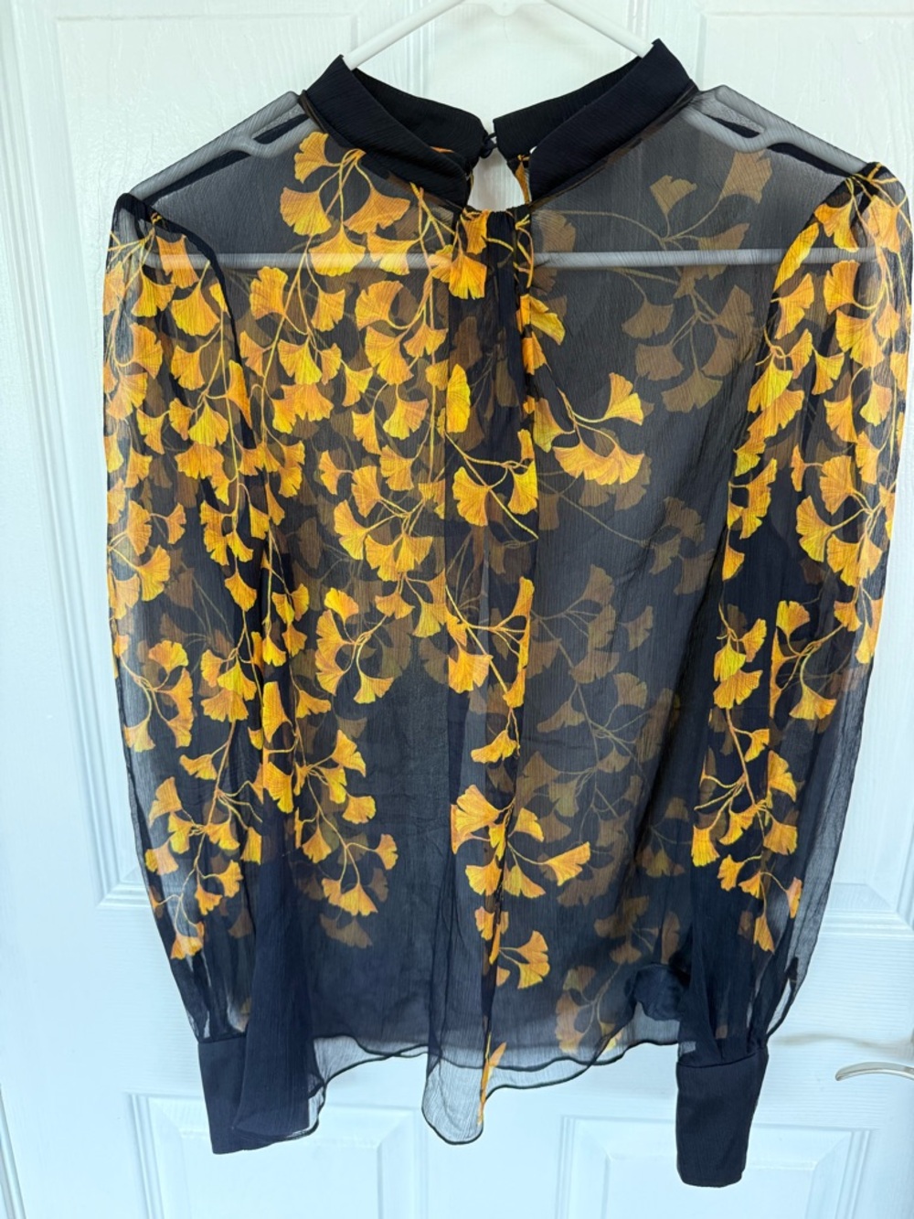 Sheer Black Blouse with Yellow Floral Print from THE FOLD